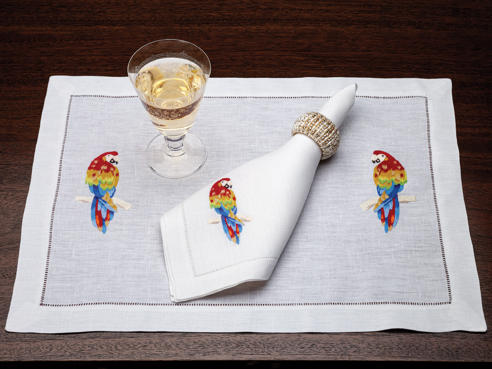 Avian Parrot-themed Placemats & Napkins: 4 of each.