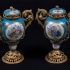 Pair of Sèvres Porcelain Urns: Side One