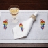 Avian Parrot-themed Placemats & Napkins: 4 of each.