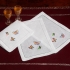 Butterfly Grove Cocktail Napkins: Multicolored embroidery & hand-hemstitched border