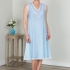 Raina: Blue dotted-Swiss with White lace trim.